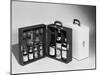 A Handy Case Containing Whisky, Martini and Gin, Mixers, a Bottle Opener and Glasses!-null-Mounted Photographic Print