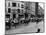 A Herd of Cattle is Driven Along a Paris Streen-null-Mounted Photographic Print