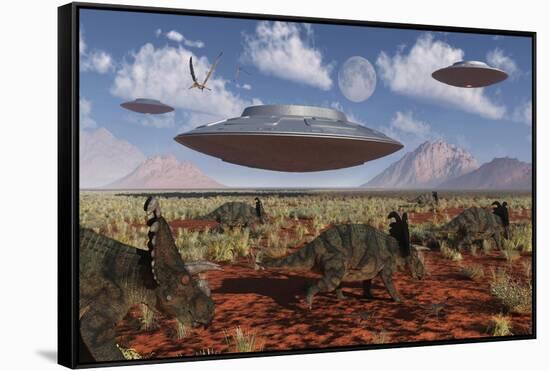 A Herd of Centrosaurus Dinosaurs Walk Past a Group of UFO'S-null-Framed Stretched Canvas