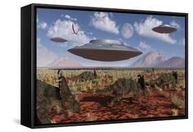 A Herd of Centrosaurus Dinosaurs Walk Past a Group of UFO'S-null-Framed Stretched Canvas