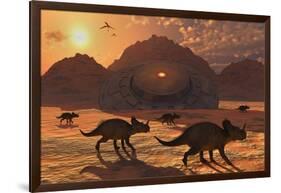 A Herd of Dinosaurs Walk Past a Flying Saucer Lodged into the Ground-null-Framed Art Print