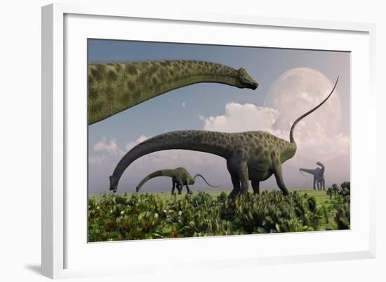 A Herd of Diplodocus Sauropod Dinosaurs Grazing-null-Framed Art Print