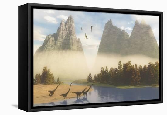 A Herd of Mamenchisaurus Dinosaurs Grazing Along a River-Stocktrek Images-Framed Stretched Canvas