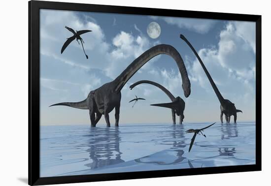 A Herd of Omeisaurus Sauropod Dinosaurs in Shallow Water-null-Framed Art Print