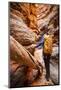 A Hiker Navigates Her Way Through Mystery Canyon, Zion National Park, Utah-Louis Arevalo-Mounted Photographic Print