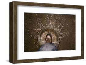 A Hiking Boot Splashing in a Puddle in a Parking Lot in Boulder, Colorado-Sergio Ballivian-Framed Photographic Print