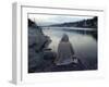 A Hindu Pilgrim Meditates Along the Bank of the Ganges River-null-Framed Premium Photographic Print