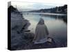A Hindu Pilgrim Meditates Along the Bank of the Ganges River-null-Stretched Canvas