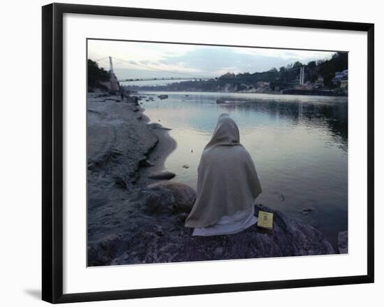 A Hindu Pilgrim Meditates Along the Bank of the Ganges River-null-Framed Photographic Print