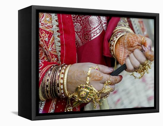 A Hindu Woman Performs Religious Rituals as She Offers Prayers to the Sun God-null-Framed Stretched Canvas