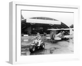 A Honda All Terrain Cycle Pulling a Vintage Biplane, 1982-null-Framed Photographic Print