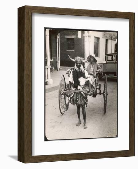 A Horned Rickshaw Man in Bulawayo, Southern Rhodesia (Now Zimbabwe)-null-Framed Photographic Print