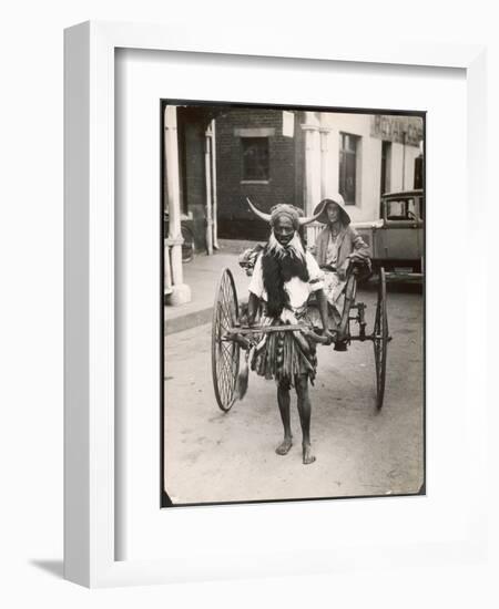 A Horned Rickshaw Man in Bulawayo, Southern Rhodesia (Now Zimbabwe)-null-Framed Photographic Print