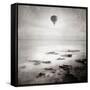 A Hot Air Balloon Floating Above the Sea-Trigger Image-Framed Stretched Canvas