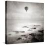 A Hot Air Balloon Floating Above the Sea-Trigger Image-Stretched Canvas
