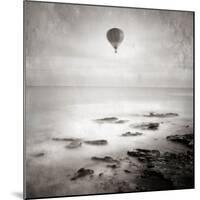 A Hot Air Balloon Floating Above the Sea-Trigger Image-Mounted Photographic Print