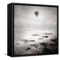 A Hot Air Balloon Floating Above the Sea-Trigger Image-Framed Stretched Canvas