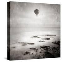 A Hot Air Balloon Floating Above the Sea-Trigger Image-Stretched Canvas