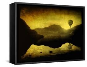 A Hot Air Balloon in Flight over Lakes and Mountains-Cristina Carra Caso-Framed Stretched Canvas