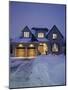 A House in a Snow Covered Landscape Lit Up at Night-null-Mounted Photographic Print