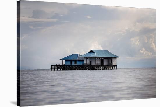 A House over the Ocean, Togian Islands, Sulawesi, Indonesia, Southeast Asia, Asia-James Morgan-Stretched Canvas