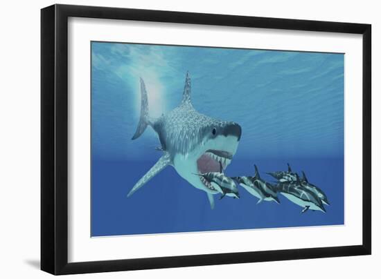 A Huge Megalodon Shark Swims after a Pod of Striped Dolphins-null-Framed Art Print