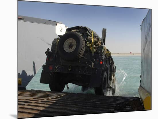 A Humvee Drives Down the Ramp of a Landing Craft Utility-Stocktrek Images-Mounted Photographic Print