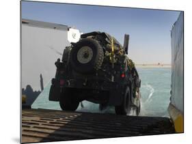 A Humvee Drives Down the Ramp of a Landing Craft Utility-Stocktrek Images-Mounted Photographic Print