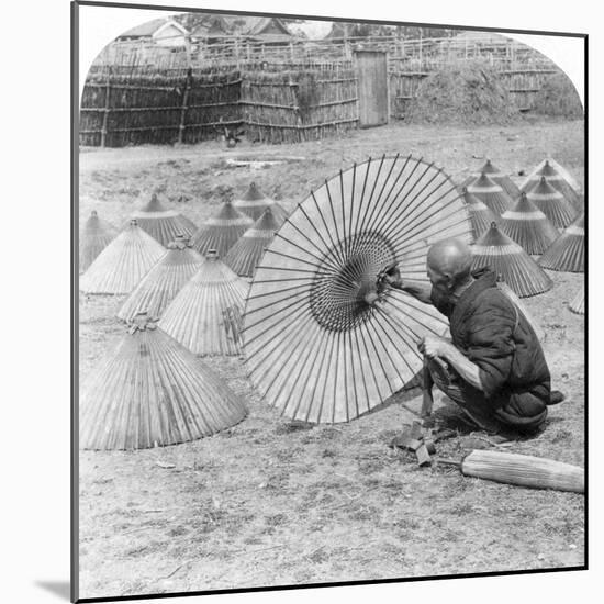 A Japanese Umbrella Maker, Kobe, Japan, 1896-Underwood & Underwood-Mounted Photographic Print