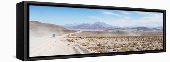 A Jeep on a Road Near the Salar De Uyuni-Alex Saberi-Framed Stretched Canvas