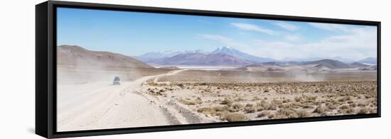 A Jeep on a Road Near the Salar De Uyuni-Alex Saberi-Framed Stretched Canvas