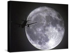 A Jet Aeroplane That Has Just Taken off from London's Heathrow Airport-null-Stretched Canvas