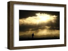 A Jogger Runs at the Foothills of the Canadian Rocky Mountains Near Calgary-Mike Blake-Framed Photographic Print