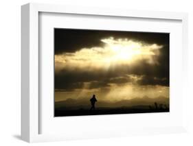 A Jogger Runs at the Foothills of the Canadian Rocky Mountains Near Calgary-Mike Blake-Framed Photographic Print