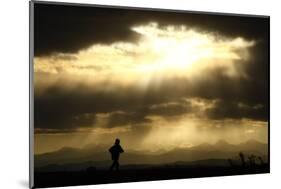 A Jogger Runs at the Foothills of the Canadian Rocky Mountains Near Calgary-Mike Blake-Mounted Photographic Print