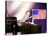 A Juvenile Bearded Dragon Places a Claw Upon an United States Flag-null-Stretched Canvas