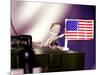 A Juvenile Bearded Dragon Places a Claw Upon an United States Flag-null-Mounted Photographic Print