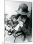 A Lady Holds a Young Chimpanzee at London Zoo, June 1922-Frederick William Bond-Mounted Photographic Print