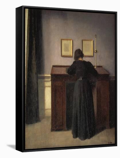 A Lady Writing at Her Desk-Vilhelm Hammershoi-Framed Stretched Canvas