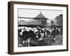 A Land Girl Working Feeding Cattle on a Farm During World War Ii-Robert Hunt-Framed Photographic Print