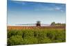 A Large Agricultural Sprayer with Wide Booms Spraying a Field of Potatoes in Rural Prince Edward Is-onepony-Mounted Photographic Print