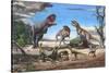 A Large Rajasaurus Roars in an Attempt to Scare Two Indosuchus Away from their Kill-null-Stretched Canvas