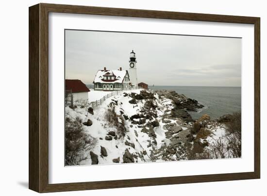 A Large Wreath is Hung on Portland Head Lighthouse in Maine to Celebrate the Holiday Season. Portla-Allan Wood Photography-Framed Photographic Print