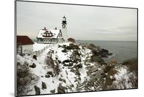 A Large Wreath is Hung on Portland Head Lighthouse in Maine to Celebrate the Holiday Season. Portla-Allan Wood Photography-Mounted Photographic Print