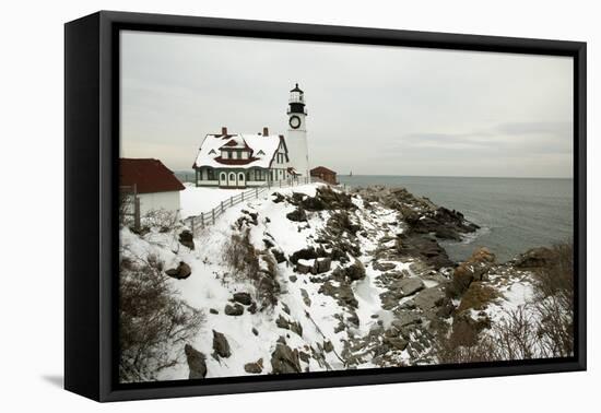 A Large Wreath is Hung on Portland Head Lighthouse in Maine to Celebrate the Holiday Season. Portla-Allan Wood Photography-Framed Stretched Canvas