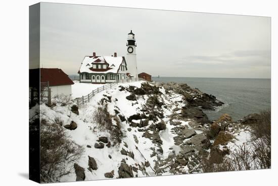 A Large Wreath is Hung on Portland Head Lighthouse in Maine to Celebrate the Holiday Season. Portla-Allan Wood Photography-Stretched Canvas