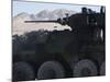 A Light Armored Vehicle Fires its 25Mm Bushmaster Chain Gun-null-Mounted Photographic Print