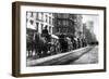 A Line Of Horse-Drawn Wagons Hauling Snow In New York City-null-Framed Art Print