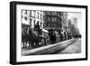 A Line Of Horse-Drawn Wagons Hauling Snow In New York City-null-Framed Art Print