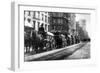 A Line Of Horse-Drawn Wagons Hauling Snow In New York City-null-Framed Art Print